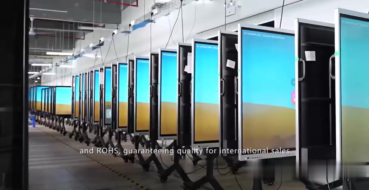 rows of interactive displays running aging tests on the e-uniwill factory floor